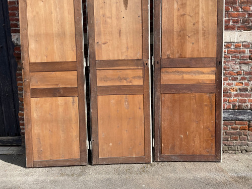 Suite of three three-panel doors