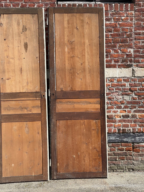Suite of three three-panel doors