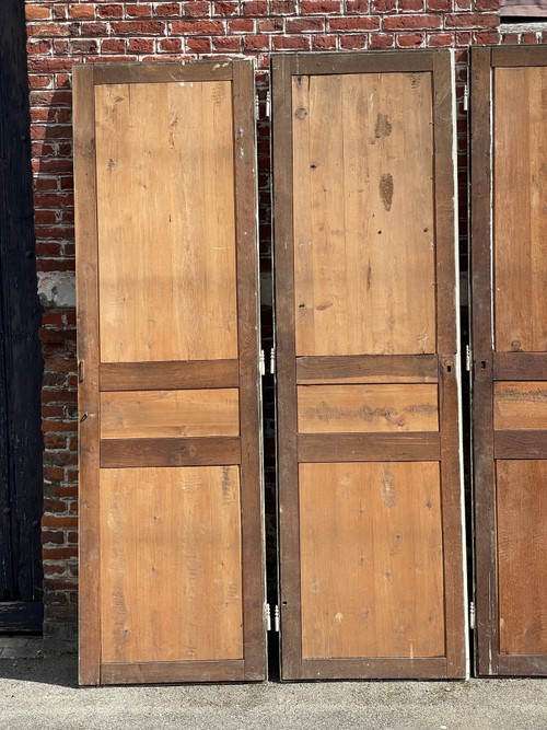 Suite of three three-panel doors