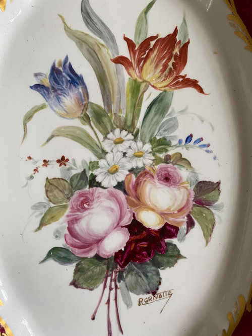 Plat en faïence signé R Grivotte