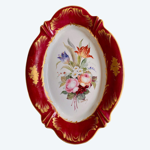 Plat en faïence signé R Grivotte