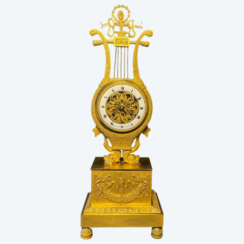Empire period ormolu Lyre clock with dolphins