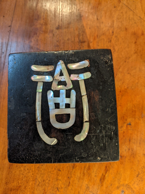 An ebony cube...