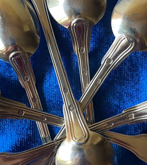 6 vermeil teaspoons.