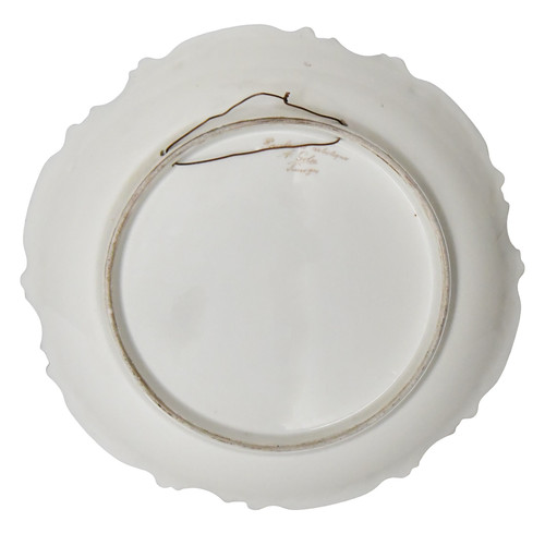 Paire de plats en porcelaine de Limoges décor de scènes de chasse peints par Abel Golse (1844-1937)