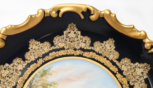 Paire de plats en porcelaine de Limoges décor de scènes de chasse peints par Abel Golse (1844-1937)