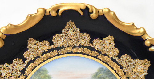 Paire de plats en porcelaine de Limoges décor de scènes de chasse peints par Abel Golse (1844-1937)