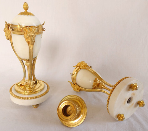 Pair of gilt bronze and marble cassolette candelabras with inverted candlesticks, Louis XVI style