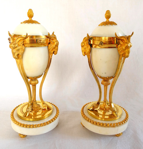 Pair of gilt bronze and marble cassolette candelabras with inverted candlesticks, Louis XVI style