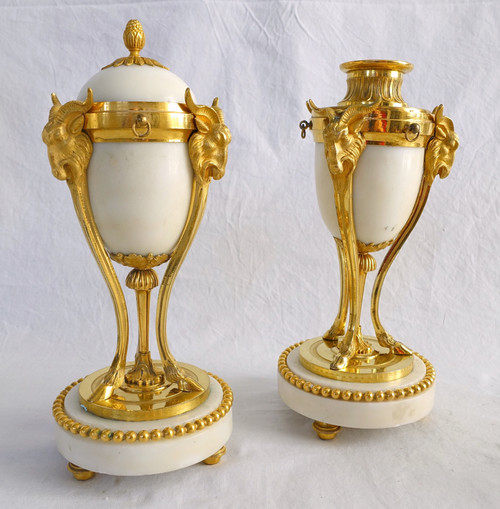 Pair of gilt bronze and marble cassolette candelabras with inverted candlesticks, Louis XVI style
