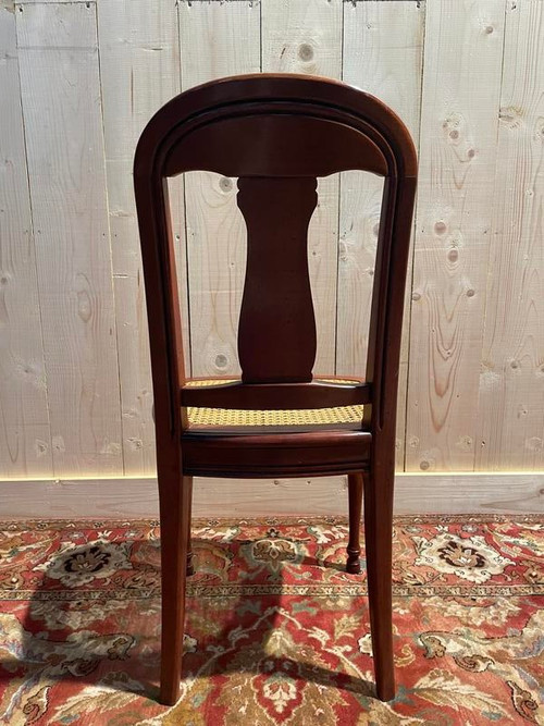 Suite mit 6 Louis-Philippe-Stühlen aus Kirschholz und Rohrgeflecht