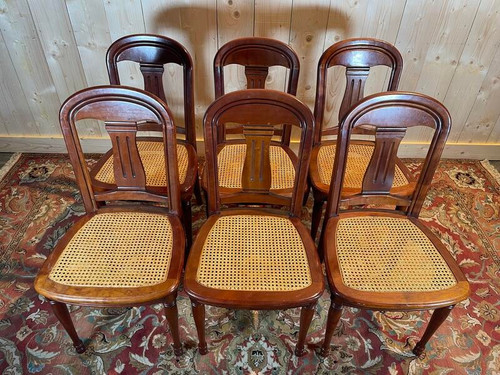 Suite mit 6 Louis-Philippe-Stühlen aus Kirschholz und Rohrgeflecht