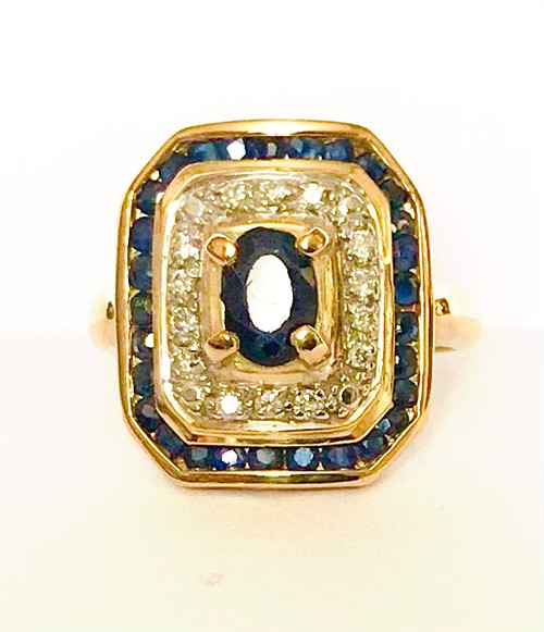 Anello cocktail in oro con zaffiri e diamanti