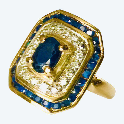 Anello cocktail in oro con zaffiri e diamanti