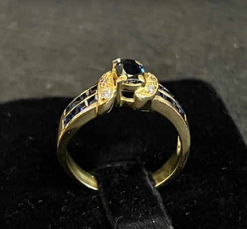 Sapphire and white stone ring