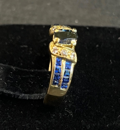 Sapphire and white stone ring