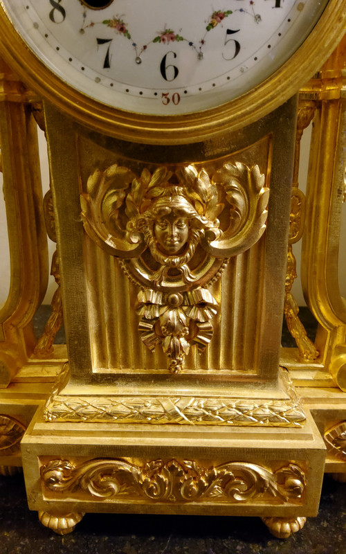 Louis XVI Style Pendulum Clock and Pair of Candlesticks in Chiseled Gilded Bronzes Susse Fd