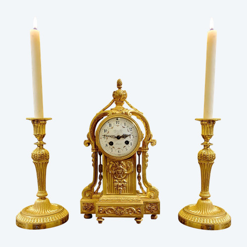 Louis XVI Style Pendulum Clock and Pair of Candlesticks in Chiseled Gilded Bronzes Susse Fd