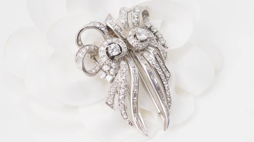 Spilla art deco a doppia clip in oro bianco e platino, diamanti