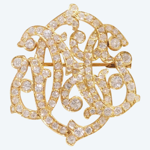 Broche volutes Art Nouveau en or jaune et diamants
