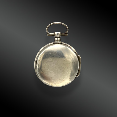Pocket watch, with cock, in silver. France, late 18th century
