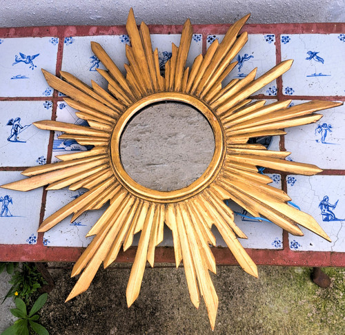 Miroir soleil en bois doré étoilé milieu XXème