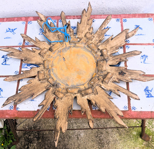 Miroir soleil en bois doré étoilé milieu XXème