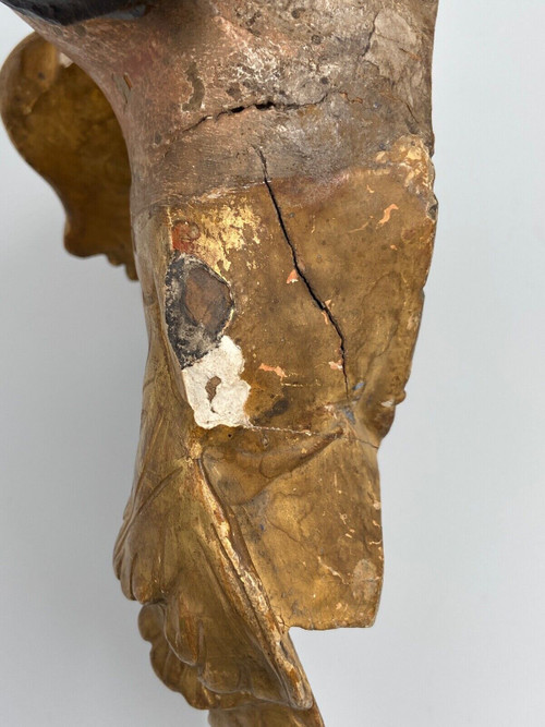 Head of a cherub in carved polychrome gilded wood, 17th century, entourage of Ignaz Günther
