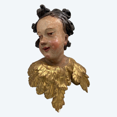 Head of a cherub in carved polychrome gilded wood, 17th century, entourage of Ignaz Günther