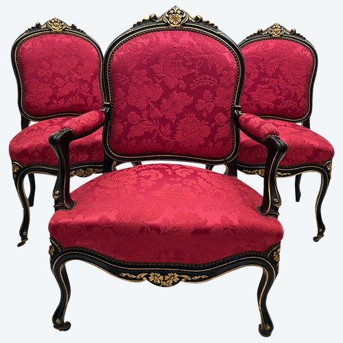 Partie de salon Napoléon III en bois laqué noir et rechampi or