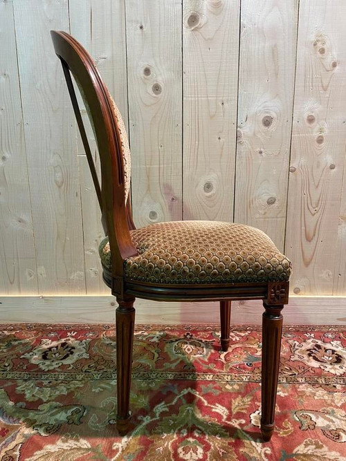 Suite de 12 chaises de Style Louis XVI 