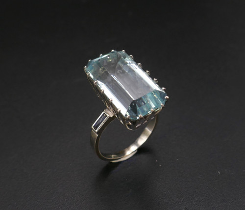 Ring Set with an Aquamarine Shouldered with Calibrated Sapphires.