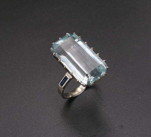 Ring Set with an Aquamarine Shouldered with Calibrated Sapphires.