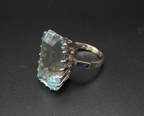 Ring Set with an Aquamarine Shouldered with Calibrated Sapphires.