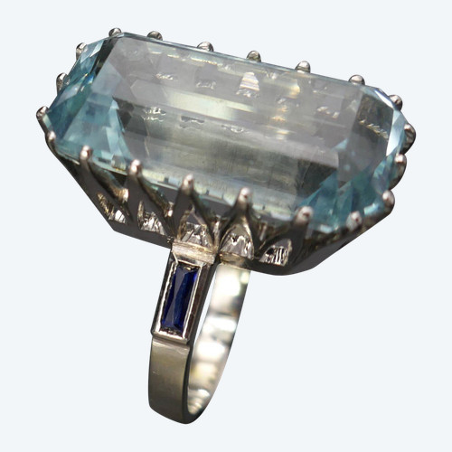 Ring Set with an Aquamarine Shouldered with Calibrated Sapphires.