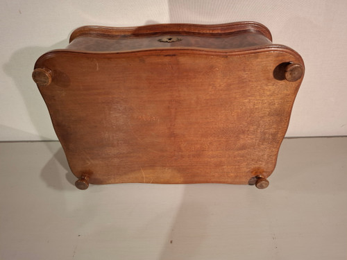 19th-century chest in light wood marquetry and cedar burr.