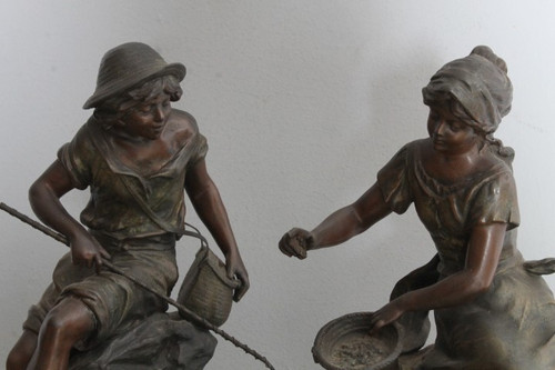 Pair of late 19th century Auguste Moreau sculptures in antimony patinated Fisherman and Peasant Girl . Mis h 46