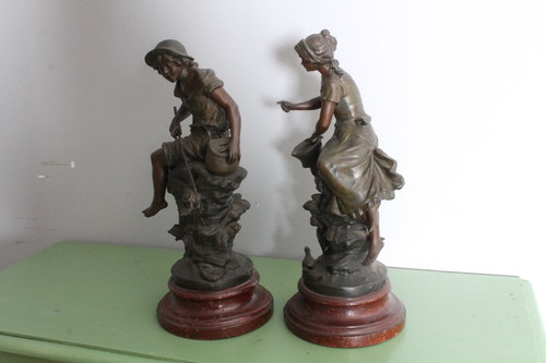 Pair of late 19th century Auguste Moreau sculptures in antimony patinated Fisherman and Peasant Girl . Mis h 46
