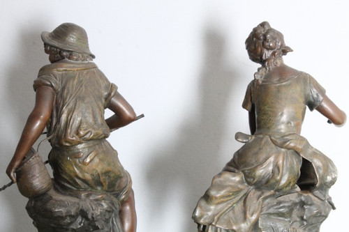 Pair of late 19th century Auguste Moreau sculptures in antimony patinated Fisherman and Peasant Girl . Mis h 46