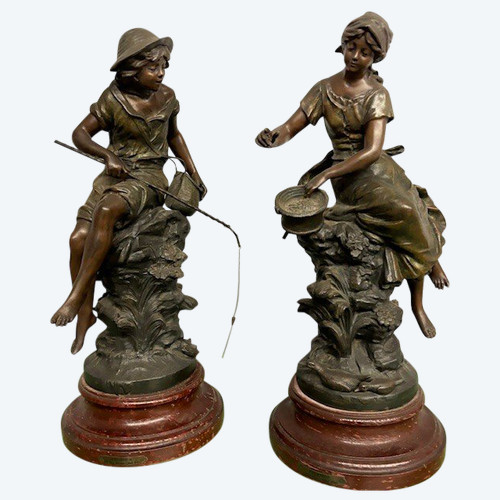 Pair of late 19th century Auguste Moreau sculptures in antimony patinated Fisherman and Peasant Girl . Mis h 46