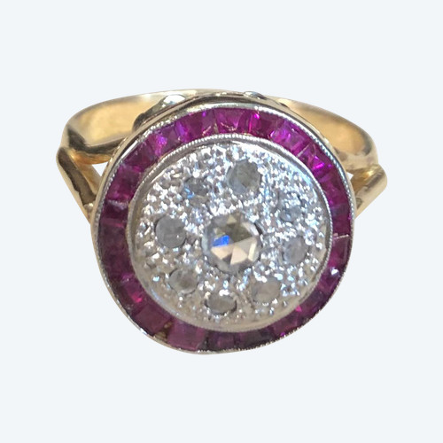 Anello con rubino rotondo e diamante
