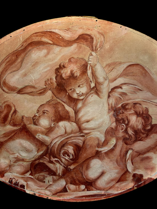 OLIO SU TELA OVALE DECORATO CON PUTTI CHE GIOCANO CON UNA SCIARPA