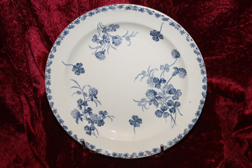 Part of a table service in earthenware decorated with shamrocks in blossom, early 20th century.