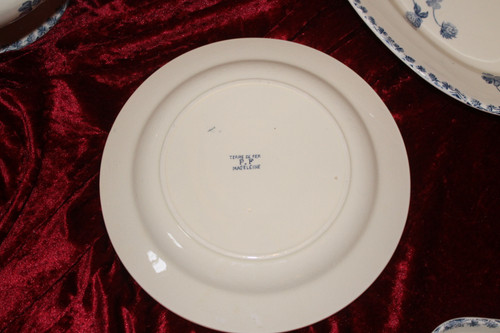 Part of a table service in earthenware decorated with shamrocks in blossom, early 20th century.