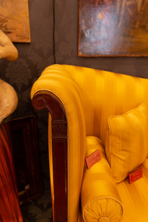 Large mahogany and mahogany veneered Sofa or Paumier from the French Empire period circa 1810