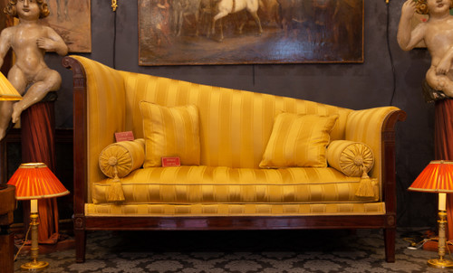 Large mahogany and mahogany veneered Sofa or Paumier from the French Empire period circa 1810