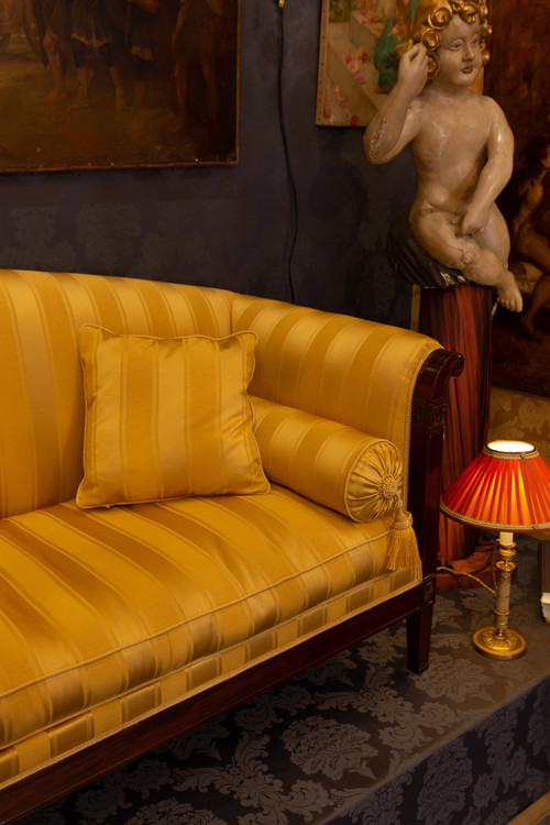 Large mahogany and mahogany veneered Sofa or Paumier from the French Empire period circa 1810
