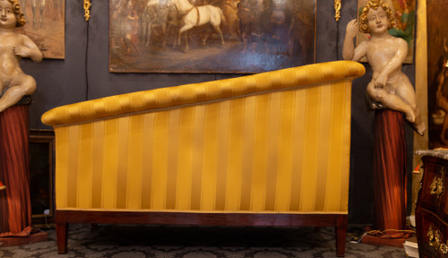 Large mahogany and mahogany veneered Sofa or Paumier from the French Empire period circa 1810