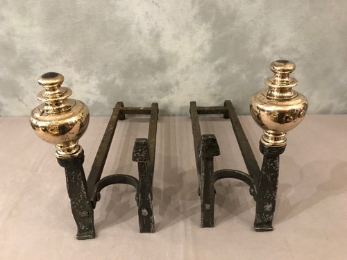 Pair of wrought iron and brass andirons from the late 17th and early 18th centuries
