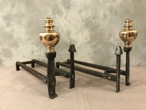 Pair of wrought iron and brass andirons from the late 17th and early 18th centuries
